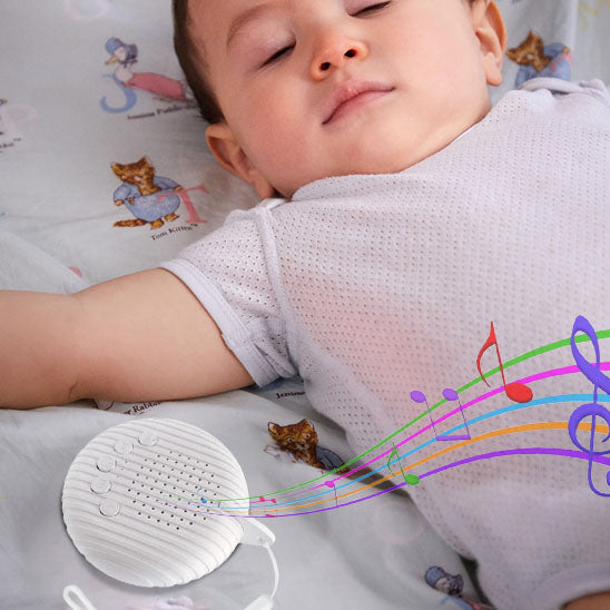 bebe endormi visage detendu securite musique machine bruit blanc