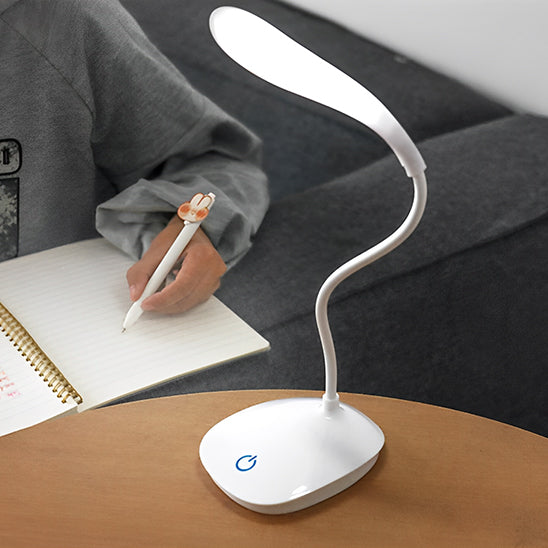 bras stylo cahier lampe de bureau leds