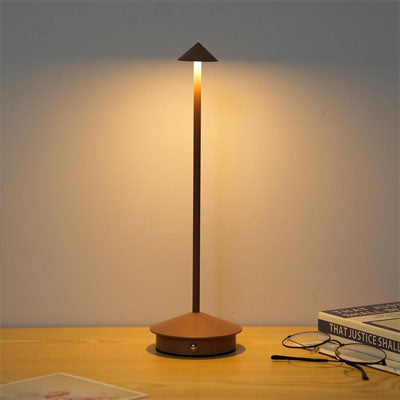 fond gris lumiere chaude lunette livre lampe noire a poser