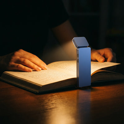 lampe de lecture rechargeable eclaire parfaitement pages livre sans reflet